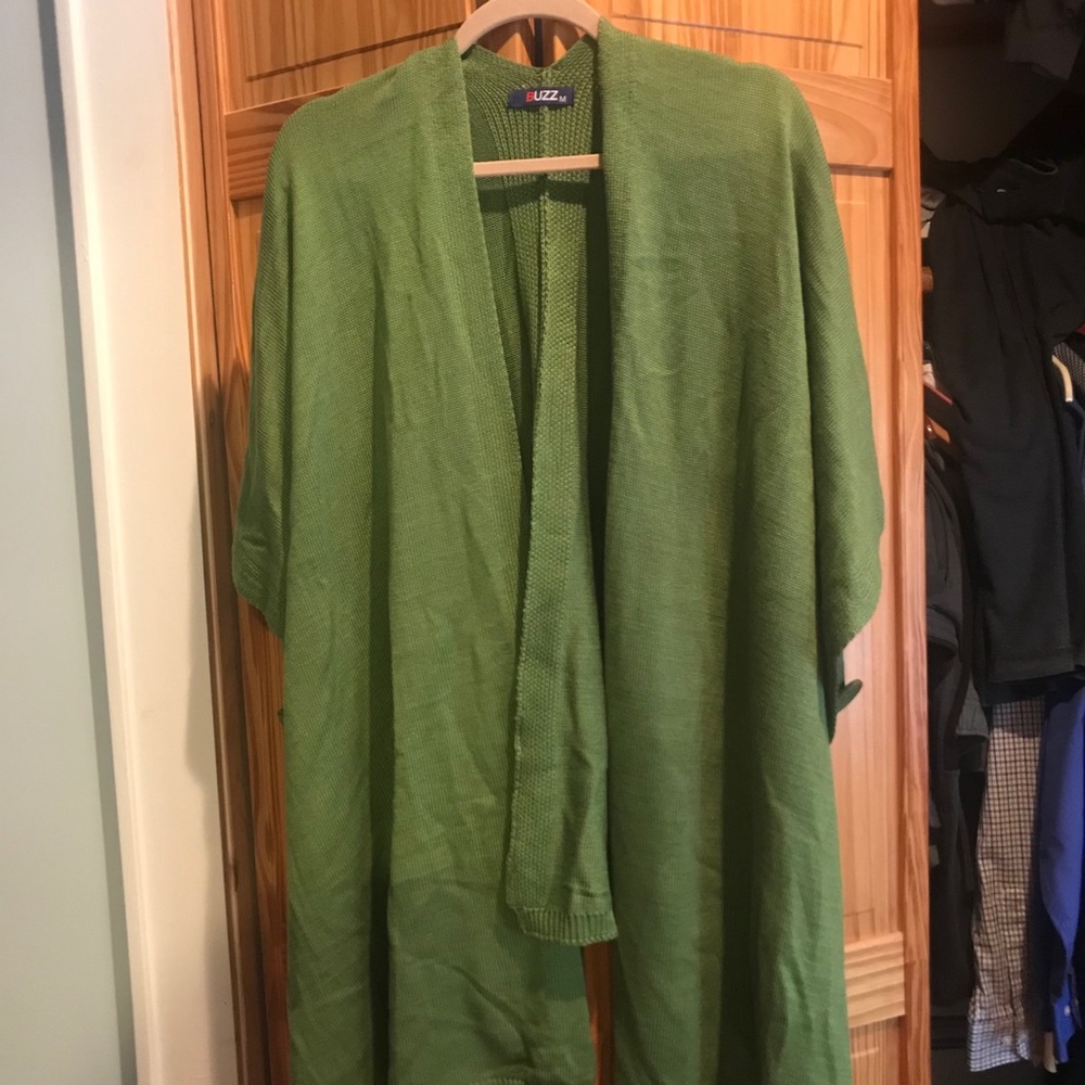 Green long tunic vest. One button on each side.